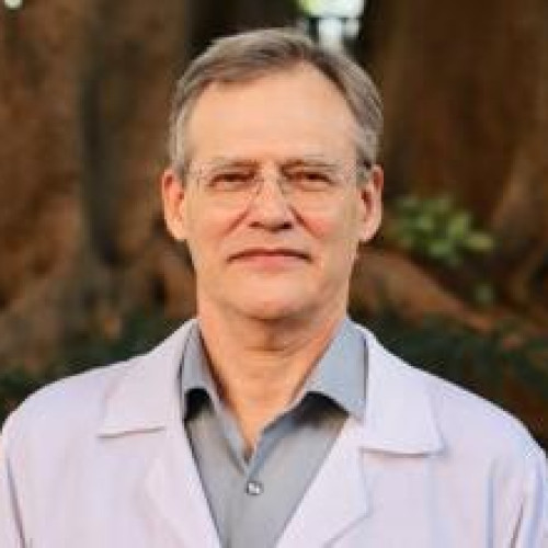 Dr. Gilles Landman